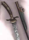 Hunting johnson with skinning knife scabbard.jpg (24905 bytes)